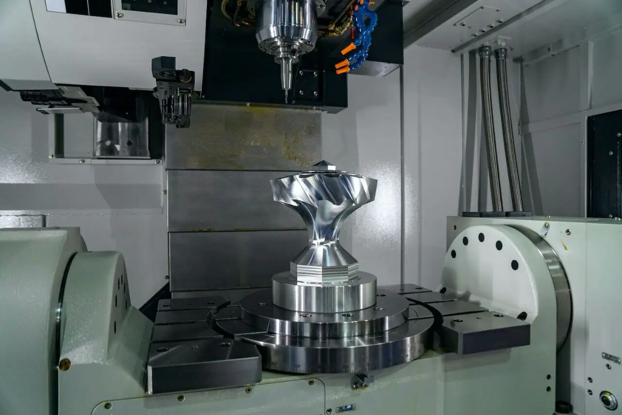 5-axis CNC machining services producing a precision metal component for rapid prototyping