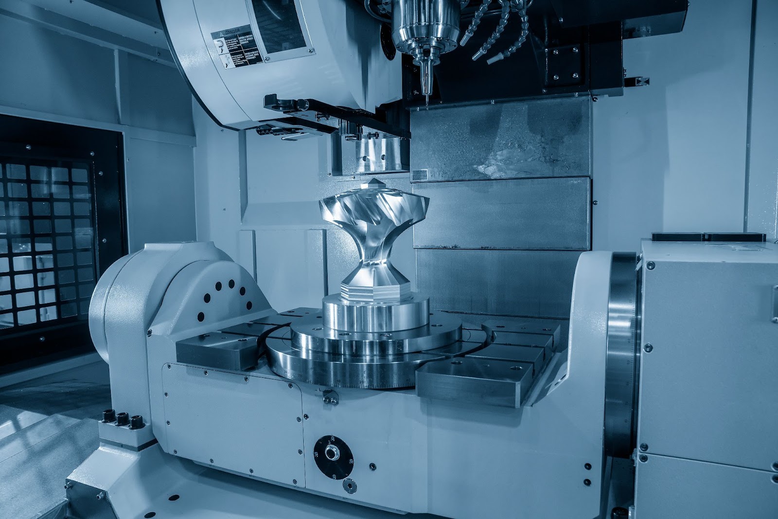 High-precision CNC machining capabilities producing a complex metal component, showcasing precision machining services, rapid prototyping services, and advanced 3D printing manufacturing solutions.